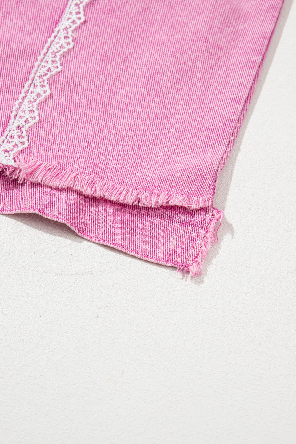 Pink fabric with lace trim 